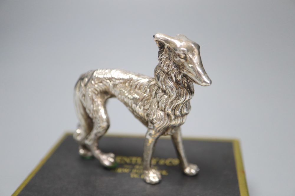A modern silver model of a dog (filled), height 62mm.